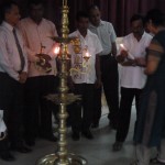 LIghting of the traditional oil lamp ceremony to open the event. Shanthi from Viluthu lighting the lamp looked on by officials of the Galle Chamber of Commerce who were the local organisers in Galle